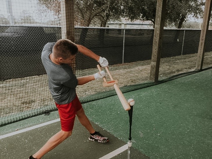 Man Using The Sequence Training Bat